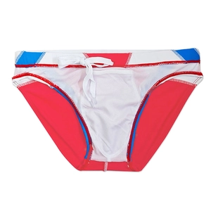 Detail showing the red, white, and blue color-block design and drawstring of men's swim briefs