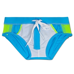Detail of blue men's swim briefs featuring neon yellow mesh side panels and drawstring