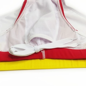 Close-up of men's swim briefs showing white mesh lining and adjustable drawstring waist