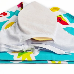Detail view of quick-dry swim briefs showing mesh lining and removable cup padding
