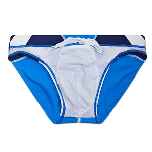 Detail of blue patchwork swim briefs showing white mesh lining and adjustable drawstring