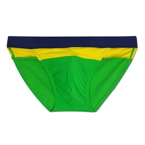 Detailed view of color-blocked men's swim briefs with blue, yellow, and green panel stitching