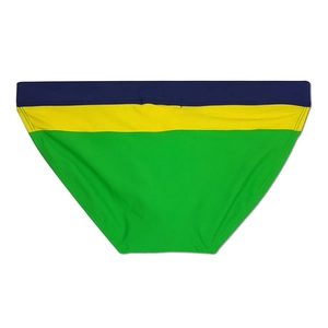 Flat lay of men's quick-dry swim briefs featuring a navy, yellow, and green color block design