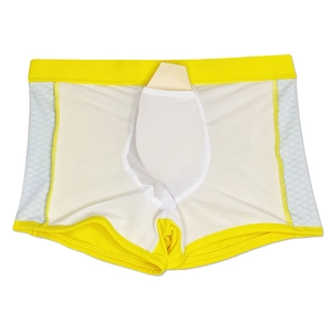 Vue détaillée du slip de bain jaune et blanc avec coque de protection et filet respirant