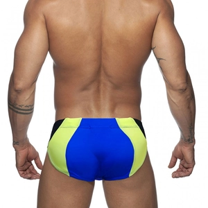 Rear view of low-rise men's swim briefs with blue and yellow color blocking