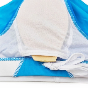 Detail of men's swim briefs featuring white mesh lining and built-in sponge padding