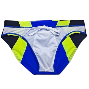 Detail of color-block swim briefs featuring blue, yellow, and black fabric with white drawstring