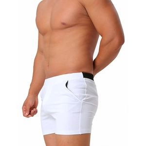 Detail view of cotton boxer shorts with side pocket and black contrast stitching on the waist