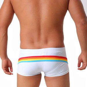 Close-up of rainbow stripes on back of white high-elastic quick-dry mens swim trunks