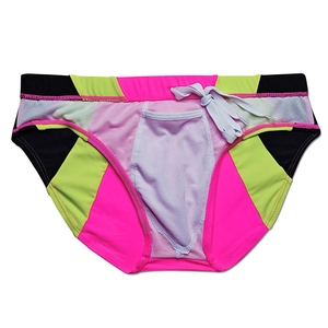 Detailed view of quick-dry men's swim briefs with color-block panels and waist drawstring