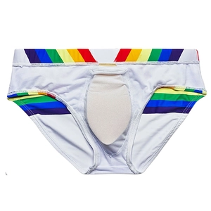 Detail view of men's white swim briefs with rainbow stripes and 3D padded pouch