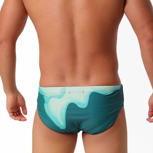 Rear view detail of dark green mens swim briefs with light blue gradient wave patterns