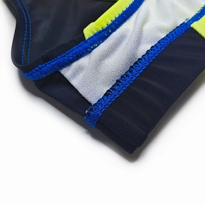 Detail view of quick-dry swim briefs featuring flatlock stitching and mesh lining