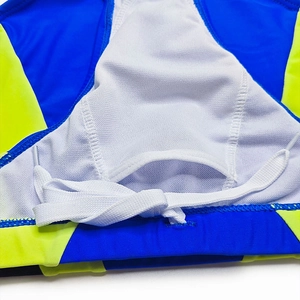 Detail view of quick-dry swim trunks with white mesh lining and adjustable drawstrings