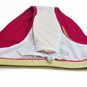 Detail view of men's swim briefs showing internal padded cup and dual-tone gradient fabric