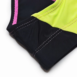 Detail view of quick-dry men's swim briefs showing contrast stitching and premium fabric