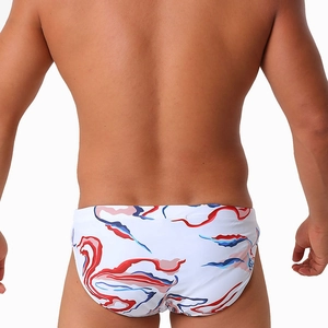 Rear view of men's white swim briefs featuring dynamic colorful wave prints on fabric