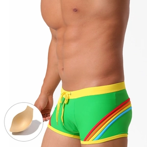 Men's bright green square-cut swim trunks with rainbow side stripes and padding