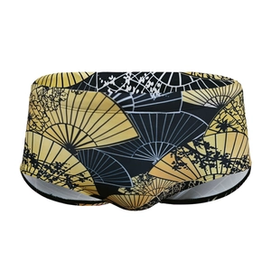 Men's black swim trunks with vintage gold fan print and quick-dry fabric design