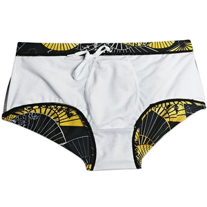 Men's swim trunks featuring vintage fan print details and adjustable waist drawstring