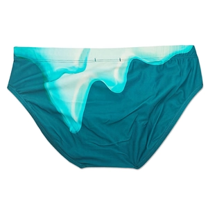 Detail view of men's swim briefs with blue gradient liquid print and elastic waist