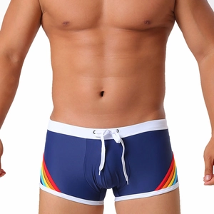Men's navy square-cut swim trunks with rainbow side stripes and white drawstring
