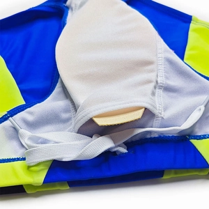 Macro detail of men's swim trunks with breathable white mesh lining and drawstring