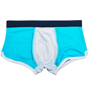 Detail view of men's blue swimming trunks with contrast waistband and U-convex pouch