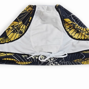 Detail of men's quick-dry swim briefs with adjustable white drawstring and fan print