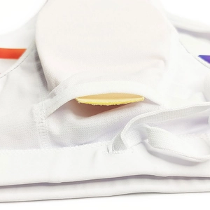 Detail view of the white swim trunk interior featuring a removable yellow padding insert