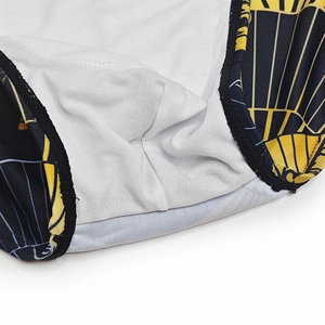 Detail of men's swim briefs showing white honeycomb mesh lining and fan pattern fabric
