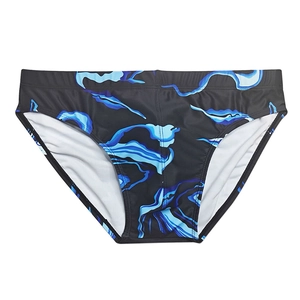 Close-up of men's swim briefs with blue flame print and white lining detail