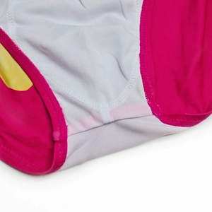 Macro view of swimsuit crotch featuring reinforced white lining and flatlock stitching