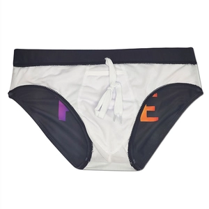 Men's swim briefs detail showing black waistband with functional white drawstring and print