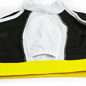 Close-up of contrast stitching and white mesh lining on tricolor men's swim trunks