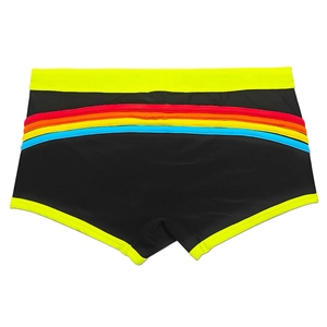 Detail of men's black swim trunks with neon yellow waistband and rainbow curved stitching