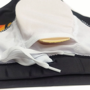 Detail of men swim trunks featuring breathable mesh lining and a removable soft pad insert