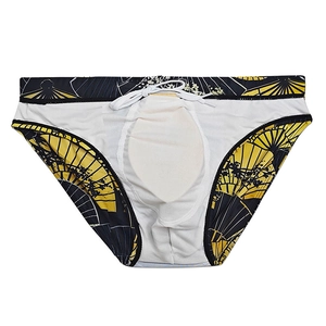 Detailed view of men's swim briefs featuring folding fan prints and internal protective pad