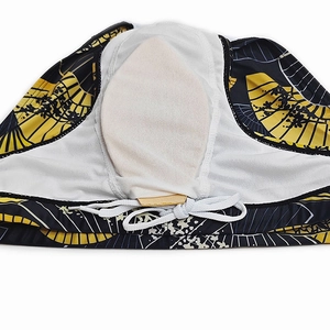 Detail of men's swimming briefs with Japanese fan print, featuring protective padding