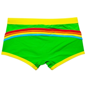 Detail of green men's swim trunks with rainbow stripes and yellow waistband on white background