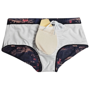 Detail of men's swim trunks featuring a removable protective cup and internal lining