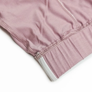 Close-up of cotton boxers featuring elastic waistband and reinforced stitching detail