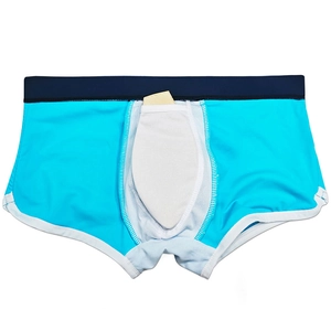 Detail showing inner ergonomic liner pocket on men's color-block swimming shorts
