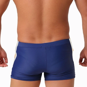 Vista posteriore del costume boxer da uomo con pannelli a contrasto blu, bianchi e arancioni