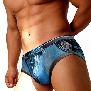 Detailed view of quick-dry men's swim briefs with creative denim print and money pattern