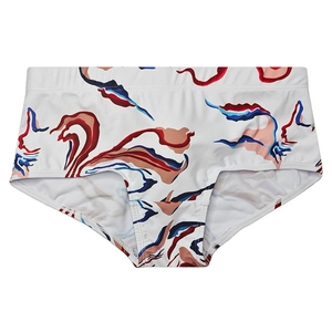 Flat lay view of men's square-cut swim trunks featuring a vibrant abstract colorful pattern
