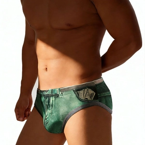 Detail of green denim print men's swim briefs with creative money pocket pattern