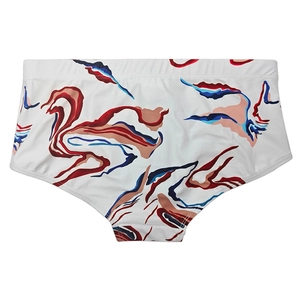 Detail of elastic wide waistband and colorful abstract digital print on swim trunks