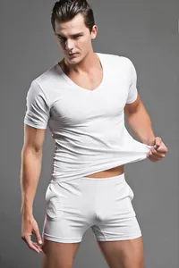 Detail of white modal knit loungewear set with slim-fit V-neck T-shirt and boxer shorts