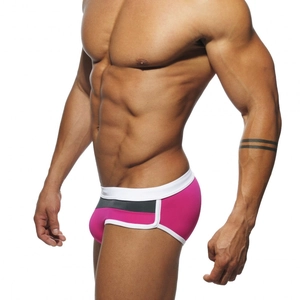 Men's sexy low-rise patchwork swim briefs in magenta and grey with white elastic waistband